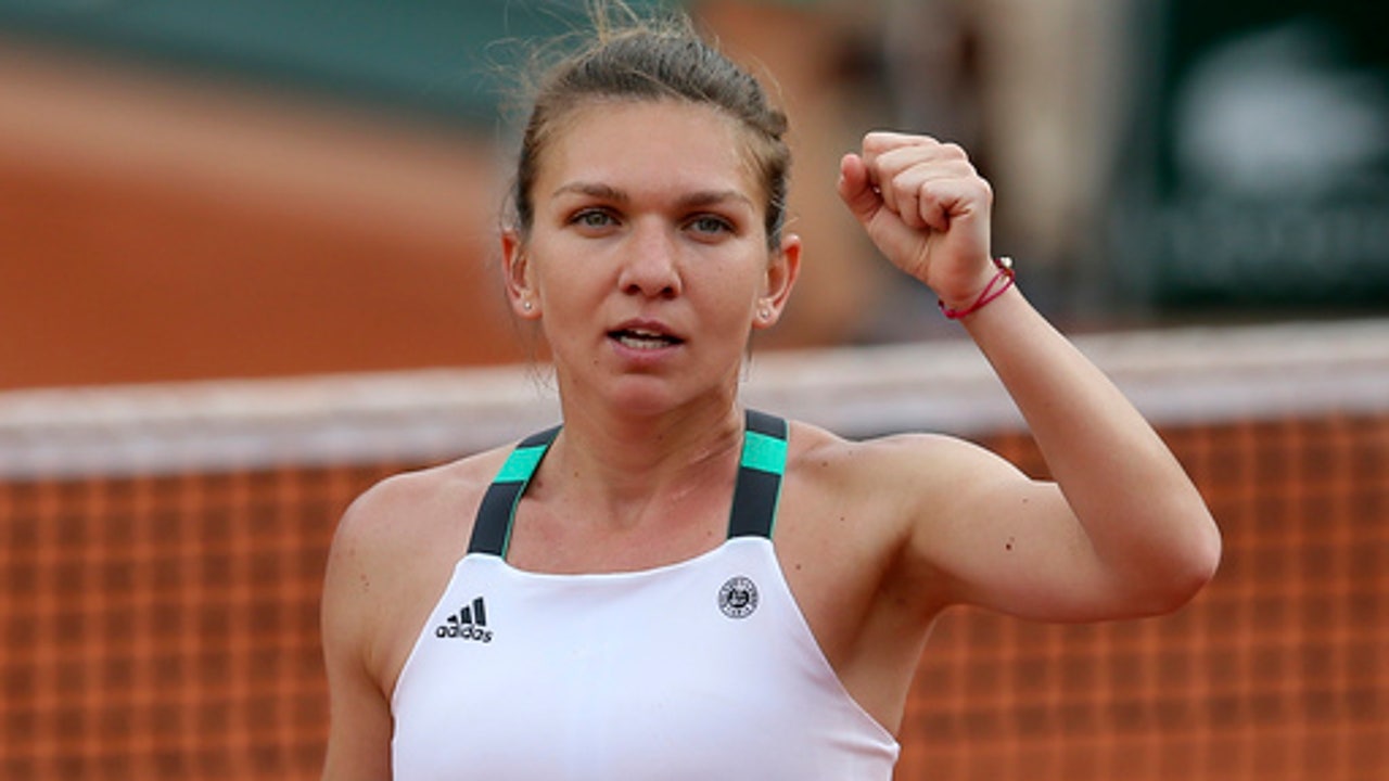 Unseeded Ostapenko tops Halep at French Open for 1st title